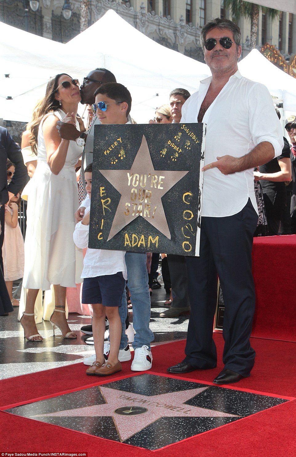 Simon Cowell has gotten his star on the Hollywood Walk of Fame 