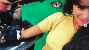 Selena gets inked