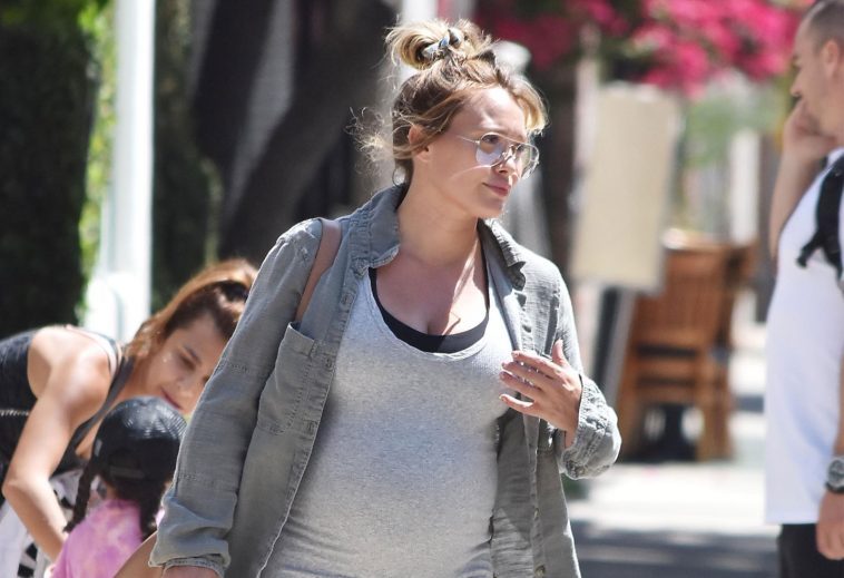 Before the time looms, Hilary Duff jumps for a Maternity photoshoot
